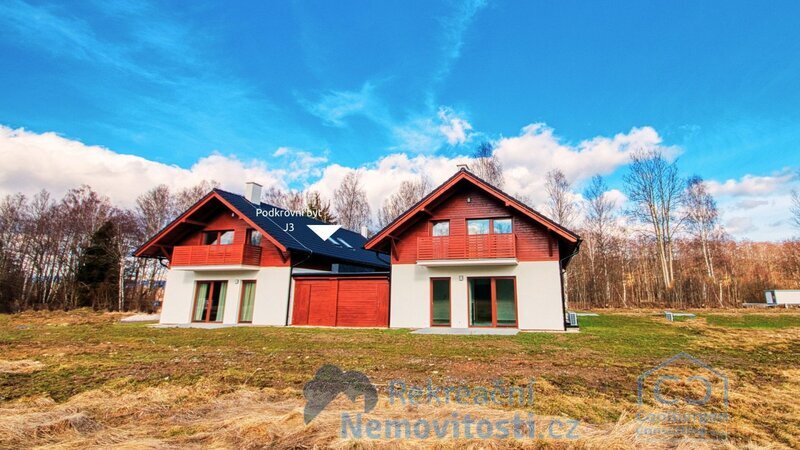 Horský apartmán u Lipenského jezera s krbem a výhledy do přírody