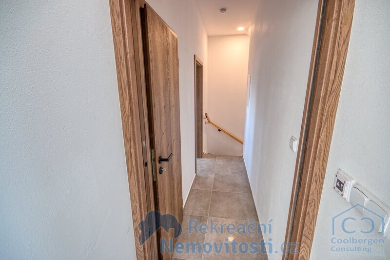 Horský apartmán u Lipenského jezera s krbem a výhledy do přírody